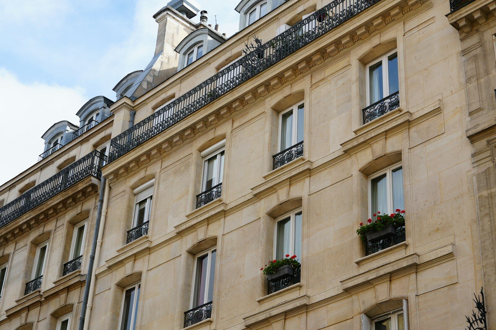 a tall building with a clock on the top of it