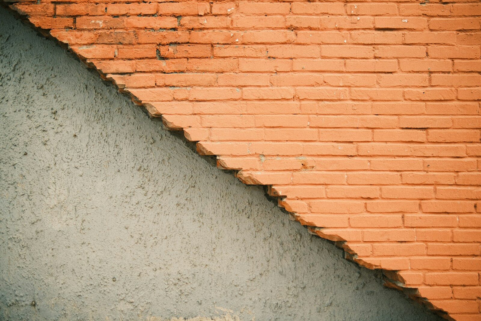 a brick wall with a shadow